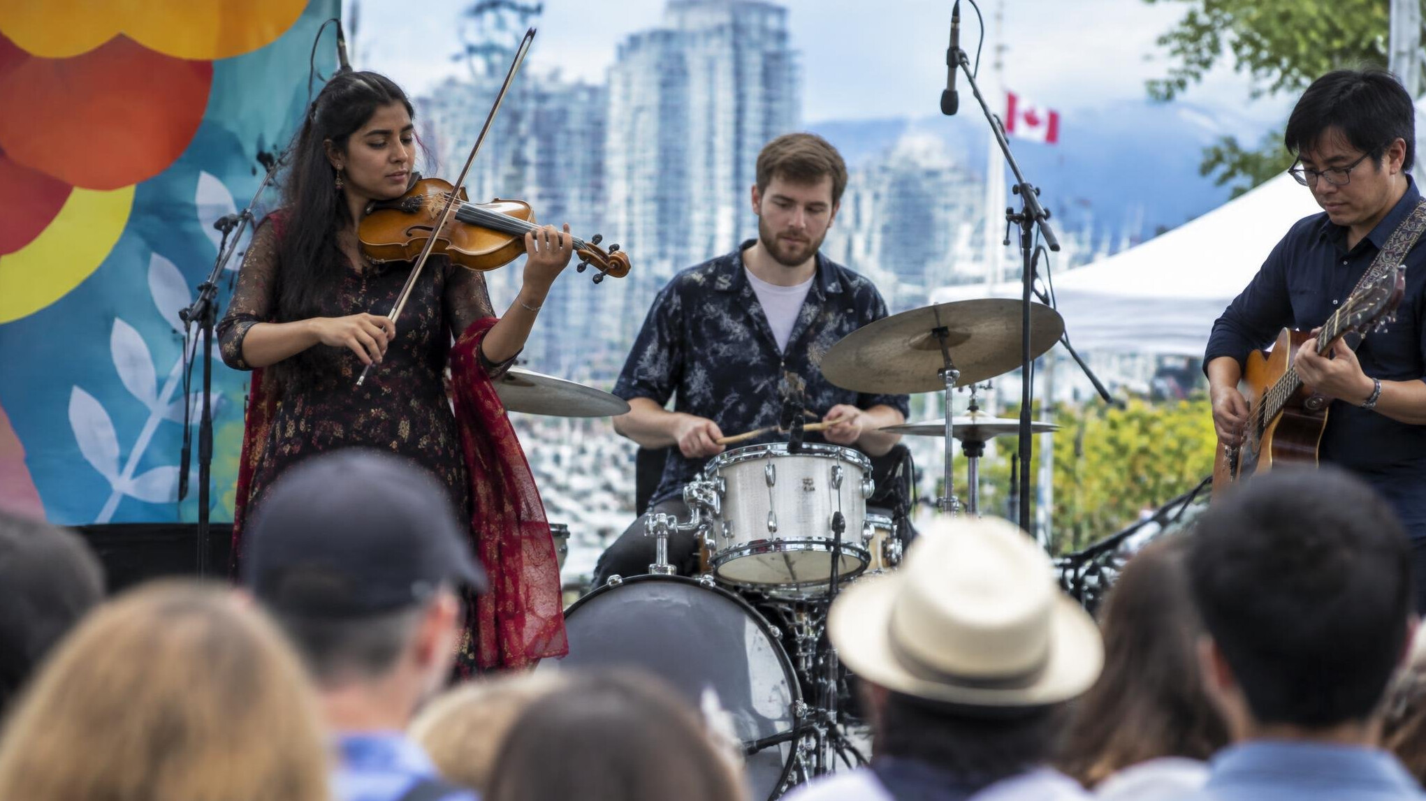 Musicians performing at an outdoor community cultural festival