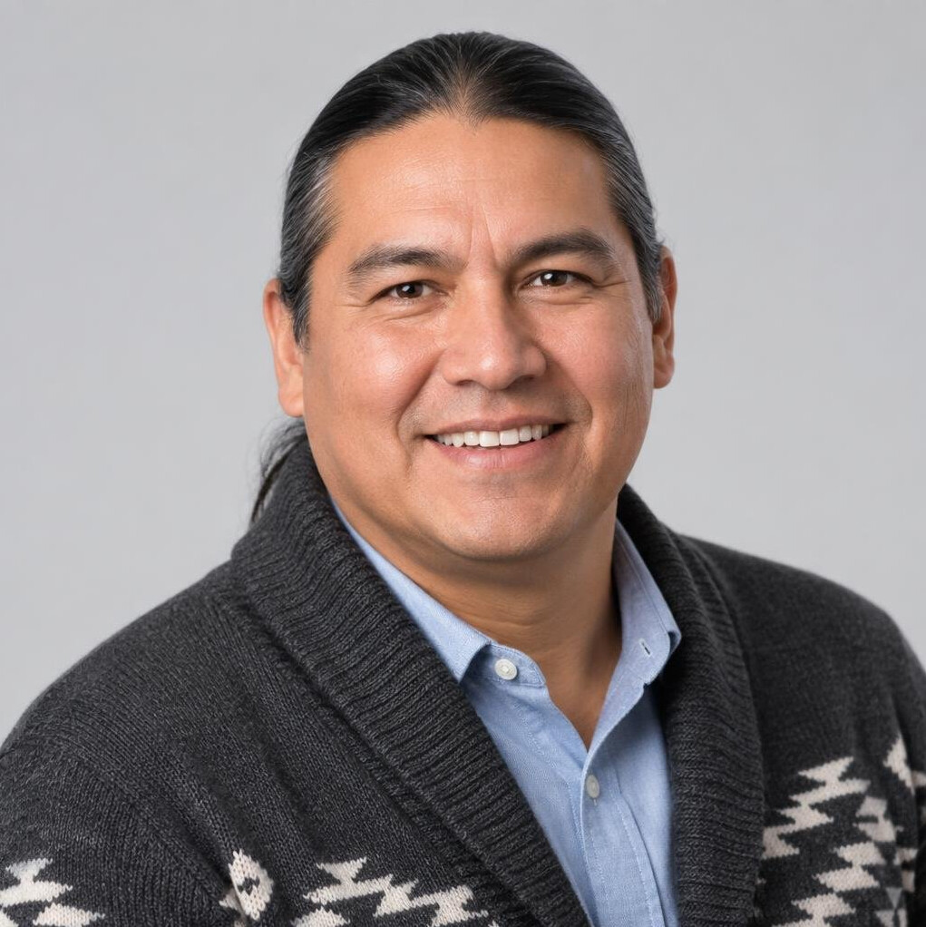Studio portrait of an Indigenous Canadian man, contributing interviewer